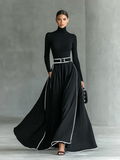 Pilar – Vestido Largo con Costuras Blancas y Cuello Alto